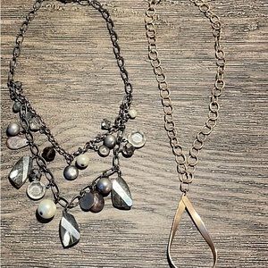2 necklaces-1 gold-tone chain w/ pendant, 1 silver/black jeweled party necklace